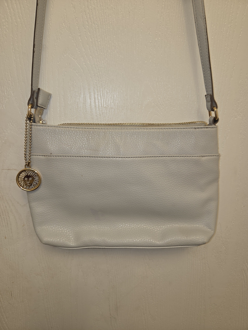 Anne Klein Light Gray Crossbody Bag with Gold Charm